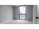 Bright bedroom with neutral walls and carpet flooring at 1280 W Peachtree Nw St # 2813, Atlanta, GA 30309