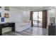 Comfortable bedroom with daybed, access to balcony and plenty of natural light at 1280 W Peachtree Nw St # 2813, Atlanta, GA 30309