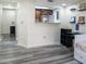 Open kitchen with breakfast bar, offering a view of the living area at 1280 W Peachtree Nw St # 2813, Atlanta, GA 30309