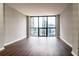 Modern living room with large window at 1280 W Peachtree Nw St # 2813, Atlanta, GA 30309