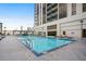 Refreshing rooftop pool with lounge chairs at 1280 W Peachtree Nw St # 2813, Atlanta, GA 30309