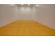 Well-lit racquetball court with hardwood floors and red boundary lines at 1280 W Peachtree Nw St # 2813, Atlanta, GA 30309