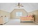 Bedroom with a vaulted ceiling, a full-size bed, a white dresser, and neutral walls and carpet at 149 Cedar Woods Trl, Canton, GA 30114