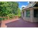 Large wooden deck, perfect for outdoor relaxation and overlooking a lush backyard at 149 Cedar Woods Trl, Canton, GA 30114