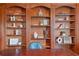 Office featuring built in custom bookshelf ideal for storage at 149 Cedar Woods Trl, Canton, GA 30114