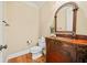 Charming powder room featuring an ornate vanity, elegant fixtures, and a classic design at 149 Cedar Woods Trl, Canton, GA 30114