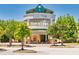 Arbor Place mall entrance showcases modern architecture surrounded by verdant landscaping at 2800 Lillian Ln, Douglasville, GA 30135
