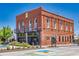 The Ritz building with outdoor seating and upper balconies exudes historic charm at 2800 Lillian Ln, Douglasville, GA 30135