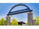 Entrance to the Town Green in Douglasville, featuring stone pillars and a sleek, modern archway sign at 2800 Lillian Ln, Douglasville, GA 30135