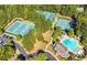 Aerial view showing tennis courts and pool area at 5402 Highland Preserve Dr, Mableton, GA 30126