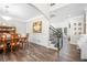 Elegant dining room with hardwood floors, a wooden table, and chair at 5402 Highland Preserve Dr, Mableton, GA 30126