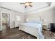 Main bedroom with hardwood floors and ensuite bathroom access at 5402 Highland Preserve Dr, Mableton, GA 30126