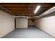 Spacious unfinished basement offering ample storage space and development possibilities at 6432 Phillips Pl, Lithonia, GA 30058