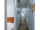 Hallway leading to additional living spaces at 6432 Phillips Pl, Lithonia, GA 30058