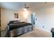 Bedroom featuring a queen size bed with zebra stripe accents, as well as a doorway at 1023 Thornwoode Ln, Stone Mountain, GA 30083