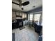 Galley kitchen with black appliances and gray cabinets at 1023 Thornwoode Ln, Stone Mountain, GA 30083