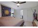 Inviting bedroom featuring a ceiling fan and neutral walls, creating a comfortable and relaxing atmosphere at 1414 Branch Dr, Tucker, GA 30084