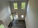 High ceiling living room with hardwood floors and fireplace at 45 Heyman Dr, Covington, GA 30016