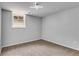 Bright basement bedroom with a window and neutral decor at 2502 Tyler Way, Decatur, GA 30032