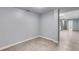 Spacious basement room with tile flooring and neutral walls at 2502 Tyler Way, Decatur, GA 30032