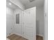 Laundry room with shelving and white door at 7236 Crestside Dr, Austell, GA 30168