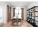 Cozy dining room with stylish decor, modern table, and ample natural light for Gathering meals at 412 Southbridge Pass, Peachtree City, GA 30269