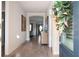 A welcoming foyer featuring wood floors, neutral walls, and stylish decor at 412 Southbridge Pass, Peachtree City, GA 30269