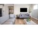 Bright living room features modern fireplace and comfortable seating at 412 Southbridge Pass, Peachtree City, GA 30269