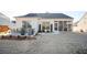 Cozy screened-in patio with comfortable seating, ideal for relaxation at 412 Southbridge Pass, Peachtree City, GA 30269