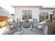 Outdoor patio setting with comfortable seating, perfect for gatherings and relaxation at 412 Southbridge Pass, Peachtree City, GA 30269