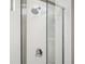 A modern shower featuring a glass door and chrome fixtures at 412 Southbridge Pass, Peachtree City, GA 30269