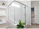 Modern shower with sleek glass enclosure and tiled walls at 412 Southbridge Pass, Peachtree City, GA 30269