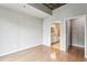 Spacious bedroom with hardwood floors and en-suite bathroom at 950 W Peachtree Nw St # 812, Atlanta, GA 30309