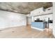 Open concept kitchen boasting stainless steel appliances and a breakfast bar at 950 W Peachtree Nw St # 812, Atlanta, GA 30309