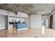 Modern kitchen with stainless steel appliances and breakfast bar at 950 W Peachtree Nw St # 812, Atlanta, GA 30309