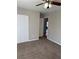 Bright bedroom with wall-to-wall carpeting and double-door closet at 10561 Aspenwood Ct, Jonesboro, GA 30238