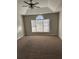 Spacious bedroom with large window and neutral carpeting at 10561 Aspenwood Ct, Jonesboro, GA 30238