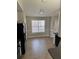 Bright breakfast nook with tile flooring and a window view at 10561 Aspenwood Ct, Jonesboro, GA 30238