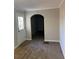 Living area with hardwood floors and access to other rooms at 10561 Aspenwood Ct, Jonesboro, GA 30238