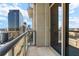 Private balcony with sliding glass door and city views at 270 17Th Nw St # 1608, Atlanta, GA 30363