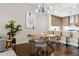 Modern dining room with hardwood floors and a round table at 270 17Th Nw St # 1608, Atlanta, GA 30363