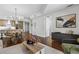 Open living room features hardwood floors, modern furniture, and a view into the kitchen at 270 17Th Nw St # 1608, Atlanta, GA 30363