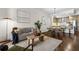 Living room with hardwood floors, comfortable seating and city views at 270 17Th Nw St # 1608, Atlanta, GA 30363