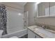 Clean bathroom, granite countertop, and bathtub shower combo at 1333 Womack Ave, Atlanta, GA 30344