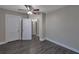 Spacious bedroom with dark hardwood floors and access to hallway at 1333 Womack Ave, Atlanta, GA 30344