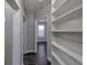 Hallway with built-in shelving and dark hardwood floors at 1333 Womack Ave, Atlanta, GA 30344