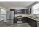Updated kitchen, stainless steel appliances and granite countertops at 1333 Womack Ave, Atlanta, GA 30344