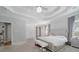 Main bedroom with king-size bed and en-suite bathroom at 323 Winding Stream Trl, Hampton, GA 30228