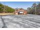 Brick house with a screened porch at 323 Winding Stream Trl, Hampton, GA 30228