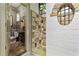 Unique bathroom featuring stone walls, a trough sink on a metal stand and an outdoor shower at 2522 Habersham Nw Rd, Atlanta, GA 30305